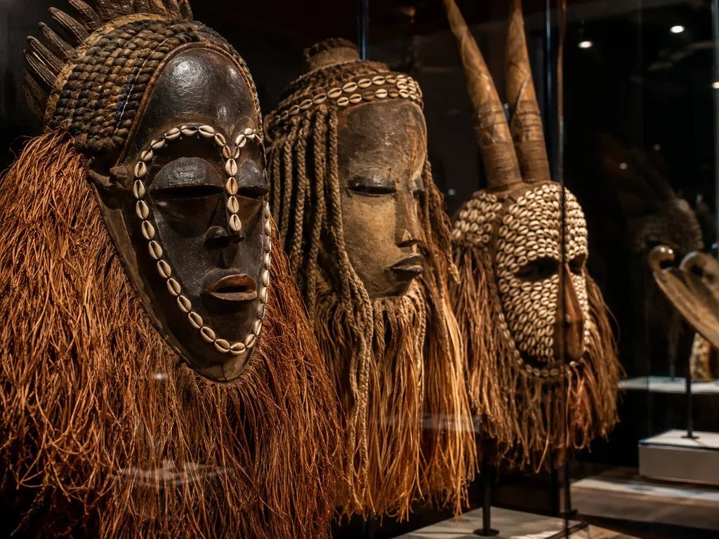 Masks on display in the Africa section of the Musée du quai Branly